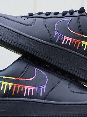 Womens Black Low-Top Sneaker with Rainbow Drip Swoosh